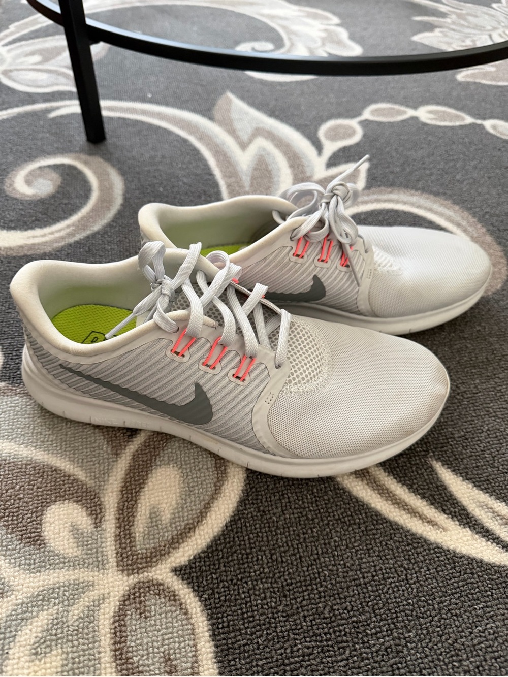 Nike Women’s White and Gray Athletic Running Shoes with Neon Pink Accents